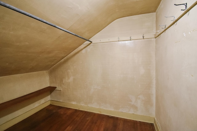 497 Commonwealth Ave, New Britain, CT 06053 - spacious closet featuring vaulted ceiling and dark wood-style flooring
