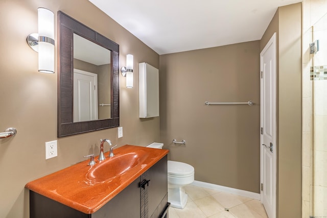 31 Philip Dr, Mansfield, CT 06268 - bathroom featuring toilet, vanity, tile patterned flooring, and baseboards