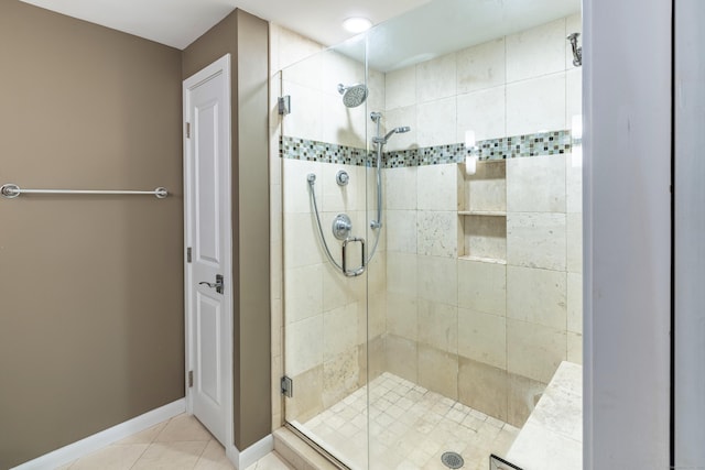 31 Philip Dr, Mansfield, CT 06268 - full bathroom featuring a stall shower, tile patterned flooring, and baseboards