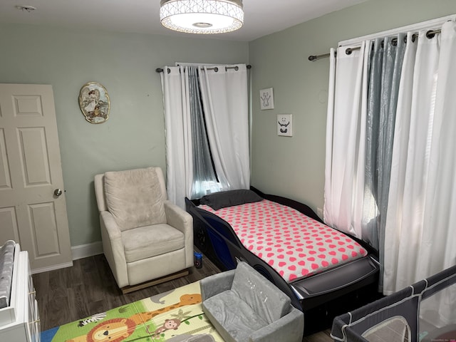 297 Laurel Ave, Bridgeport, CT 06605 - bedroom with wood finished floors and baseboards