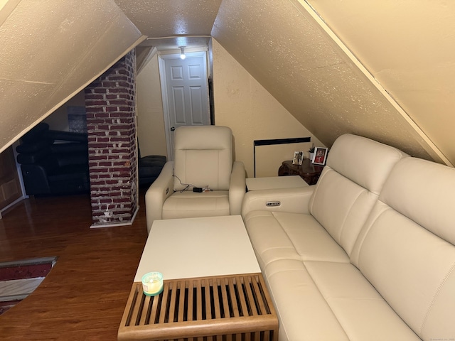 297 Laurel Ave, Bridgeport, CT 06605 - living room with wood finished floors, vaulted ceiling, and a textured ceiling