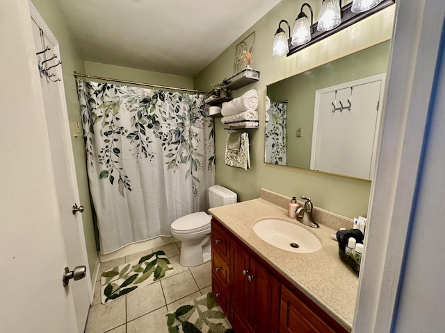 140 Hamden Ave Apt C, Waterbury, CT 06704 - bathroom with tile patterned floors, vanity, toilet, and a shower with shower curtain