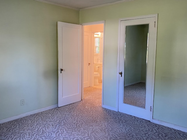 154 Wall St, Meriden, CT 06475 - unfurnished bedroom featuring carpet floors, ornamental molding, and baseboards