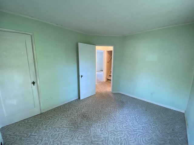 154 Wall St, Meriden, CT 06475 - carpeted empty room featuring crown molding and baseboards