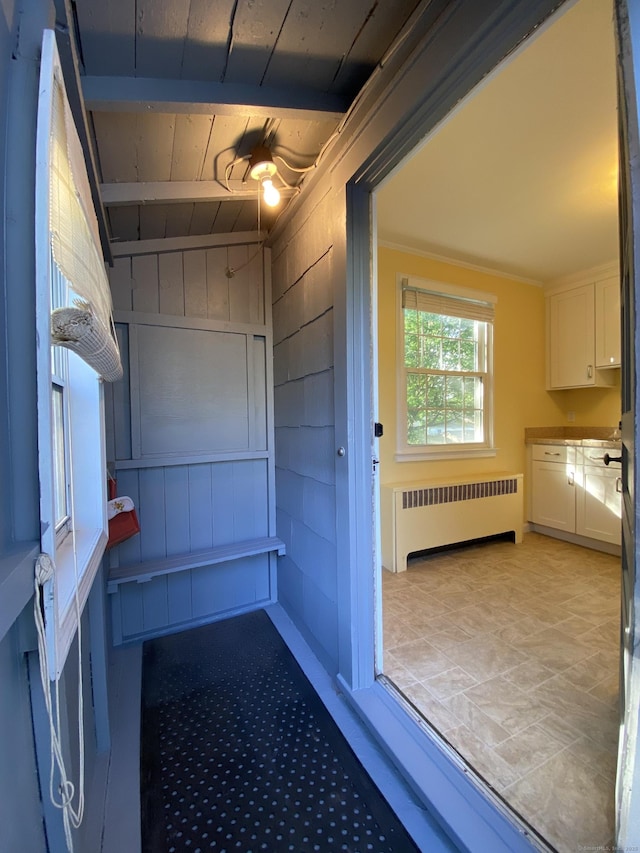 154 Wall St, Meriden, CT 06475 - entryway with radiator heating unit and wooden ceiling