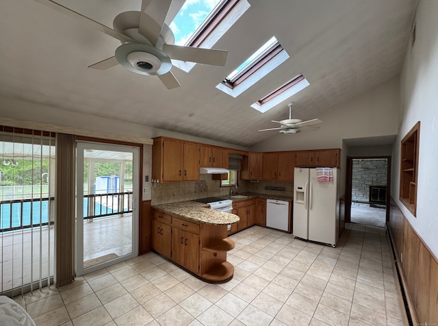 15 Zolan Dr, East Haven, CT 06513 - kitchen featuring white appliances, ceiling fan, vaulted ceiling, a peninsula, and a sink