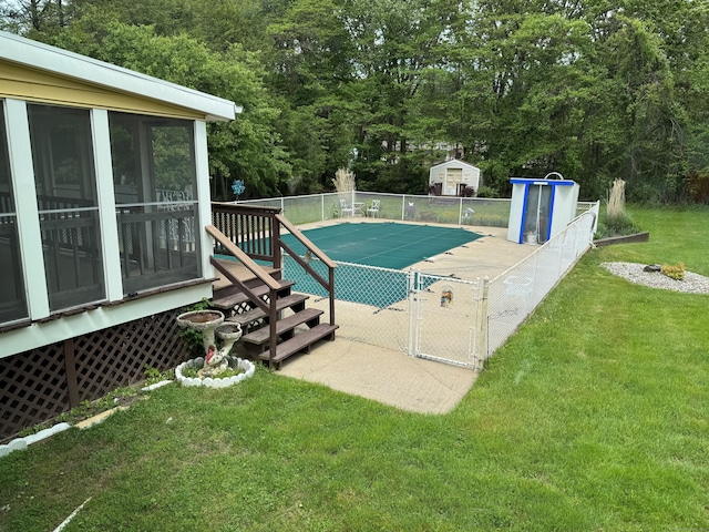15 Zolan Dr, East Haven, CT 06513 - view of swimming pool with a sunroom
