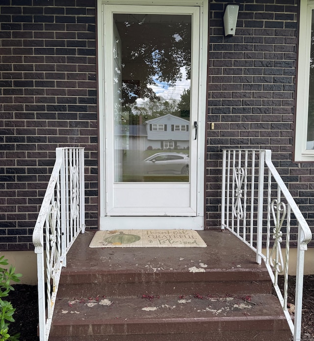 15 Zolan Dr, East Haven, CT 06513 - property entrance featuring brick siding