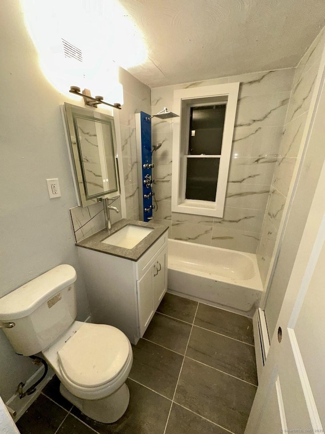 40 Dewey St, New Britain, CT 06051 - bathroom featuring toilet, tile patterned floors, vanity, washtub / shower combination, and a textured ceiling