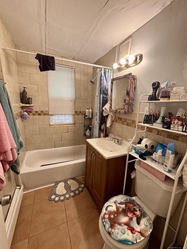 40 Dewey St, New Britain, CT 06051 - bathroom featuring tile patterned flooring, toilet, shower / bath combo with shower curtain, vanity, and a textured ceiling