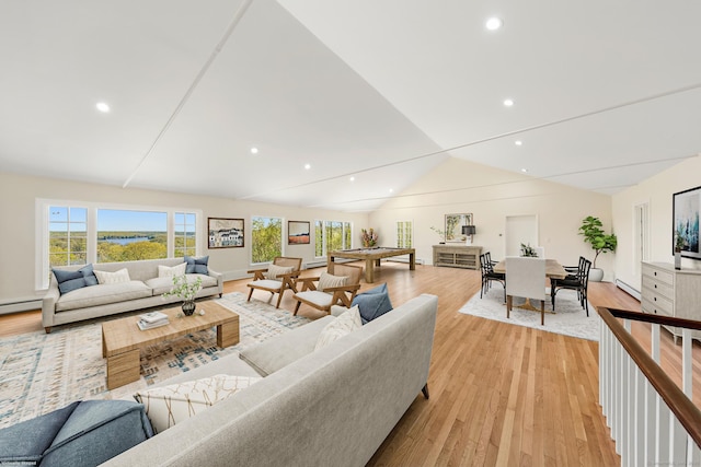 24 Newtown Tpke, Redding, CT 06896 - living area featuring plenty of natural light, light wood-style flooring, vaulted ceiling, recessed lighting, and a baseboard radiator