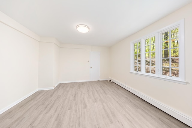 24 Newtown Tpke, Redding, CT 06896 - unfurnished room with baseboard heating, wood finished floors, and baseboards