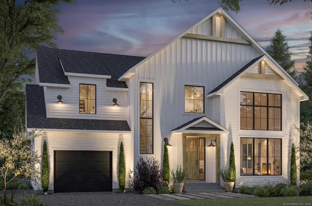 modern farmhouse style home with board and batten siding, roof with shingles, gravel driveway, and an attached garage