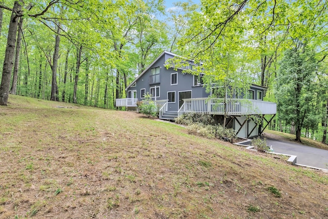 32 Old Bethel Rd, Newtown, CT 06470 - view of grassy yard with a wooden deck and driveway
