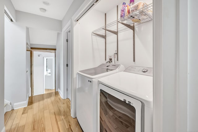 32 Old Bethel Rd, Newtown, CT 06470 - washroom with washer and dryer, light wood-style floors, and baseboards