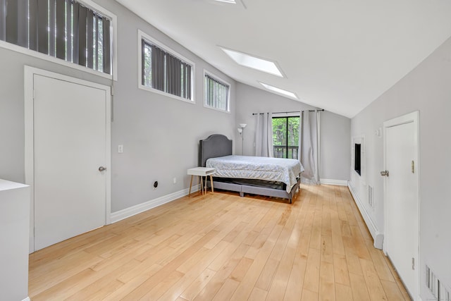 32 Old Bethel Rd, Newtown, CT 06470 - bedroom with lofted ceiling, a skylight, and light wood finished floors