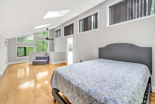 32 Old Bethel Rd, Newtown, CT 06470 - bedroom featuring baseboards, a skylight, hardwood / wood-style floors, a baseboard radiator, and lofted ceiling