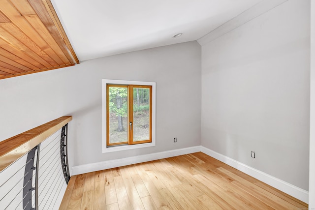 32 Old Bethel Rd, Newtown, CT 06470 - unfurnished living room with baseboards, lofted ceiling, and light wood-style flooring