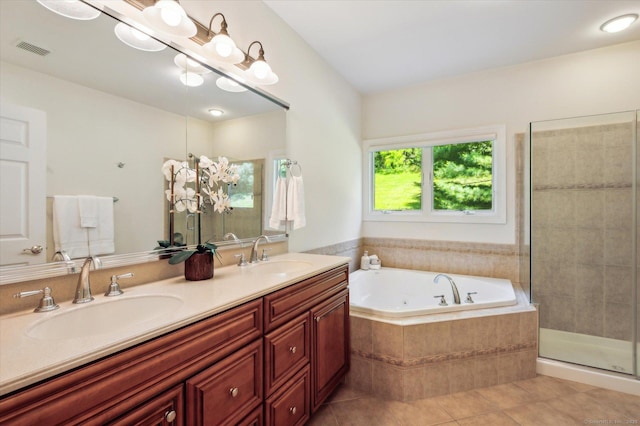 7 Wyndemere Unit 7, Avon, CT 06001 - bathroom featuring a tub with jets, tile patterned flooring, double vanity, and tiled shower