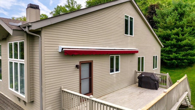 7 Wyndemere Unit 7, Avon, CT 06001 - rear view of property with a wooden deck and a chimney