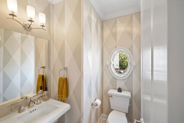442 Main Ave Unit 18 B6, Norwalk, CT 06851 - half bathroom with a sink, toilet, and ornamental molding