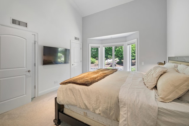 442 Main Ave Unit 18 B6, Norwalk, CT 06851 - carpeted bedroom featuring a high ceiling, access to exterior, and baseboards