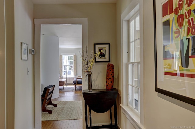 corridor with wood finished floors