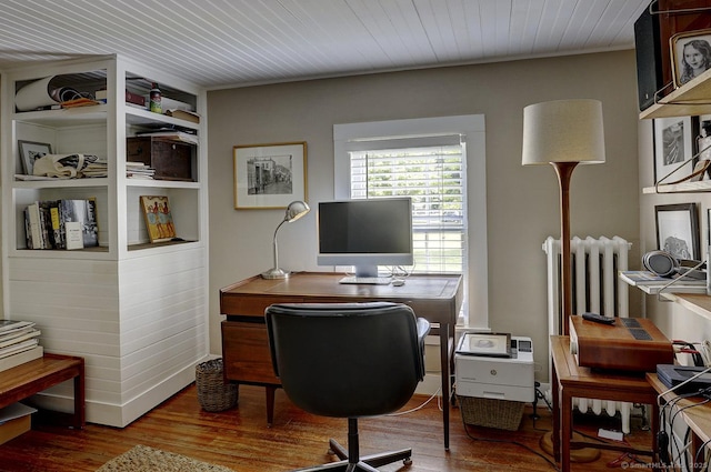 office area featuring radiator heating unit and wood finished floors