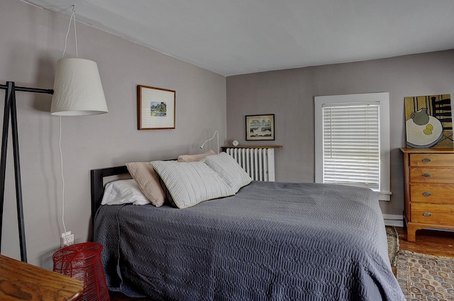 bedroom featuring wood finished floors