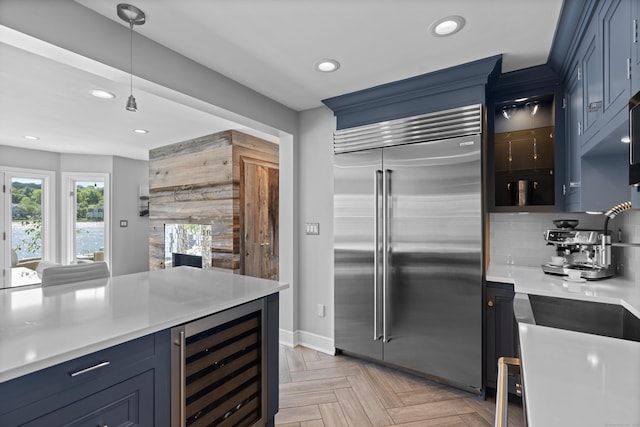 233 Front St Unit 3, New Haven, CT 06513 - kitchen featuring built in refrigerator, beverage cooler, blue cabinetry, light countertops, and recessed lighting