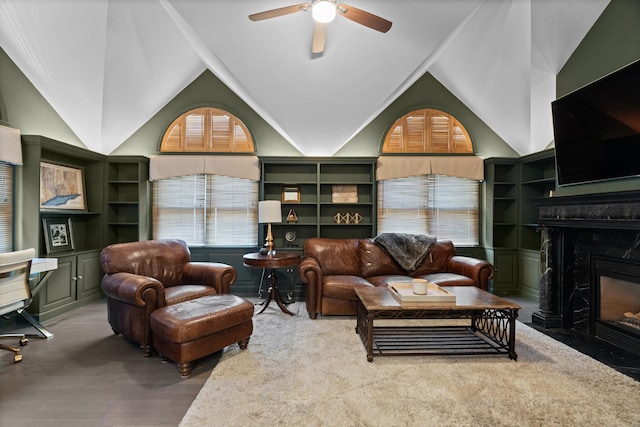 233 Front St Unit 3, New Haven, CT 06513 - living area featuring vaulted ceiling, a ceiling fan, healthy amount of natural light, a high end fireplace, and built in shelves