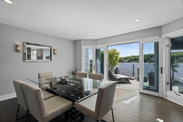 233 Front St Unit 3, New Haven, CT 06513 - dining room with wood finished floors, recessed lighting, baseboards, and a water view