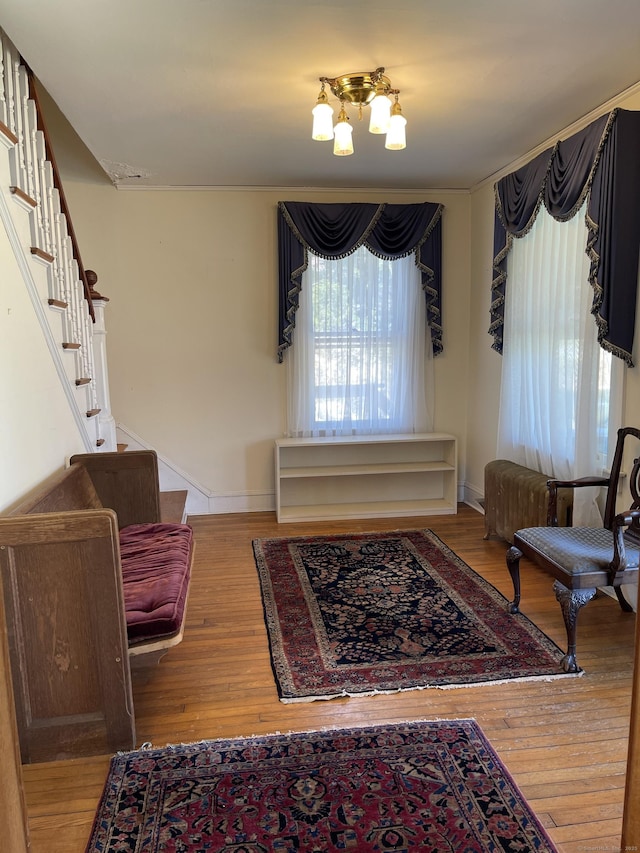 674 Williams St, New London, CT 06320 - sitting room with wood-type flooring and stairs