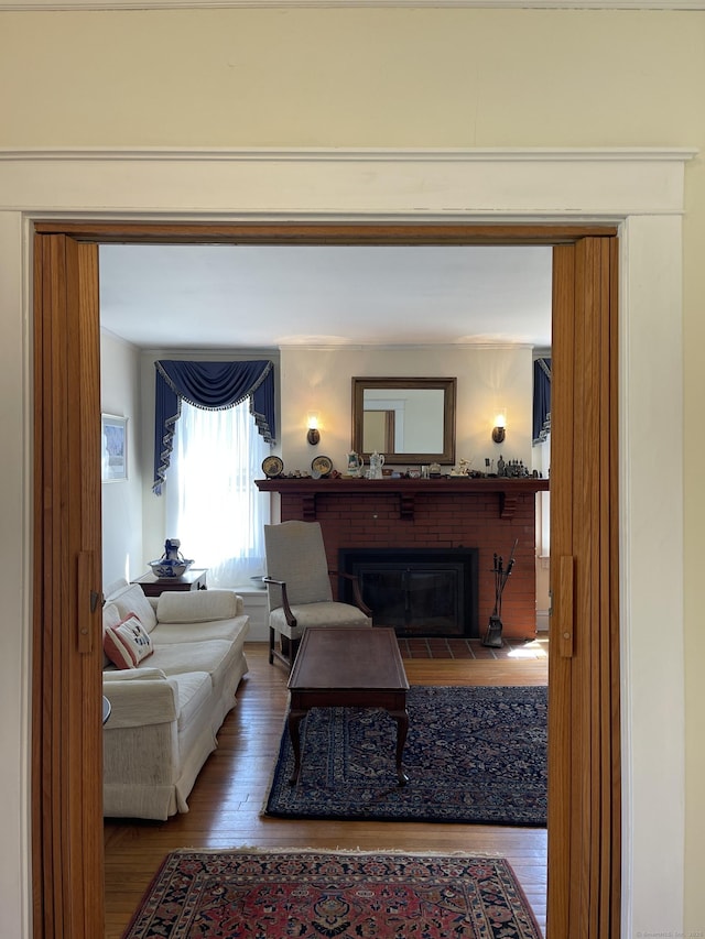 674 Williams St, New London, CT 06320 - living area featuring hardwood / wood-style flooring and a fireplace