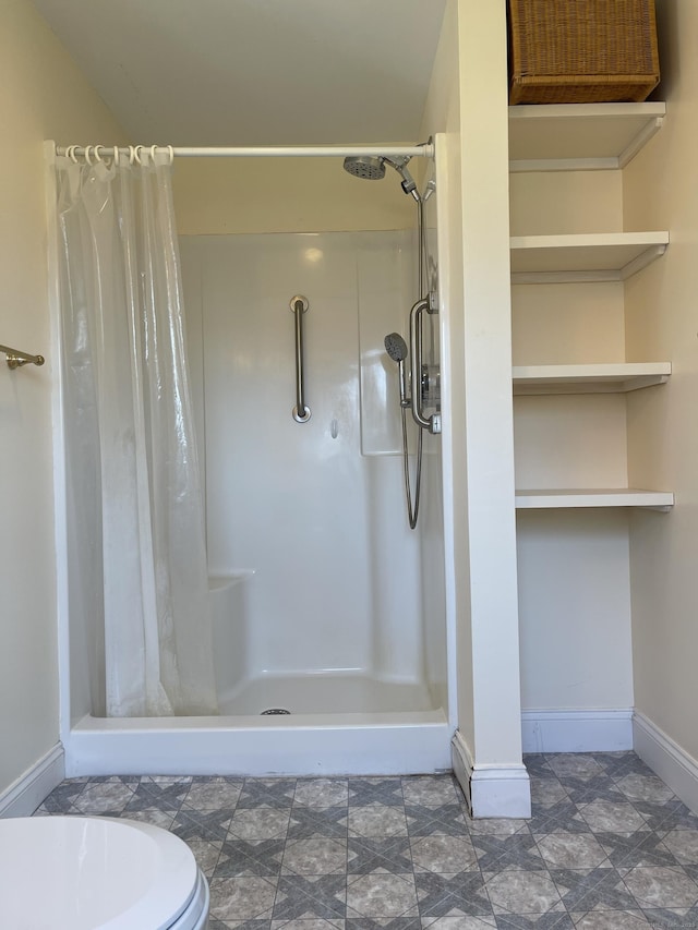 674 Williams St, New London, CT 06320 - bathroom with a stall shower and baseboards