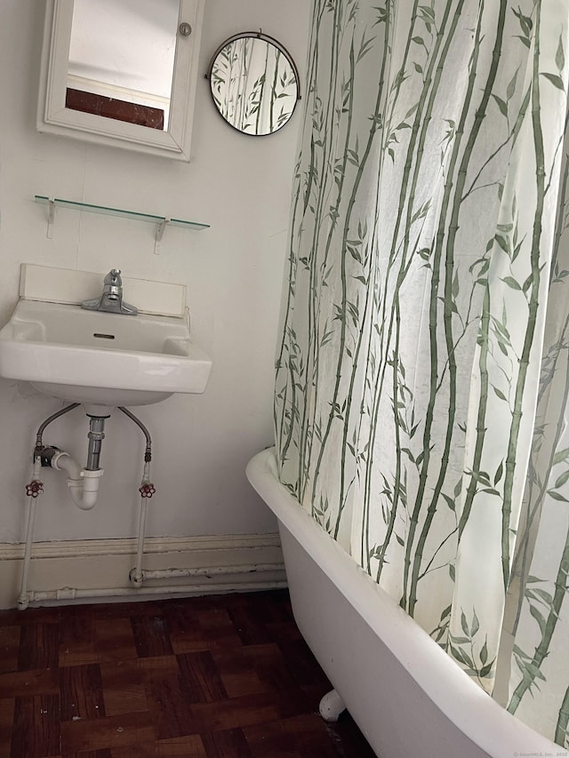 674 Williams St, New London, CT 06320 - full bath featuring a freestanding bath and a sink