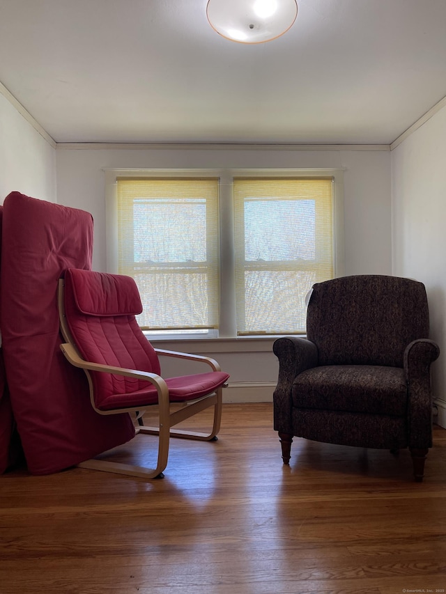 674 Williams St, New London, CT 06320 - living area featuring wood finished floors and crown molding