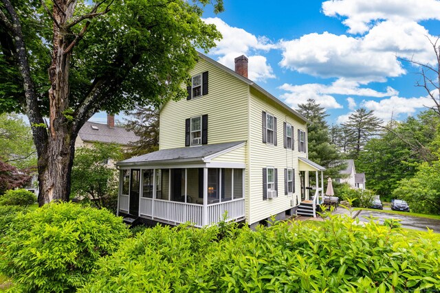 2 Middle Ln, Simsbury, CT 06070 - view of side of property featuring a chimney and a sunroom