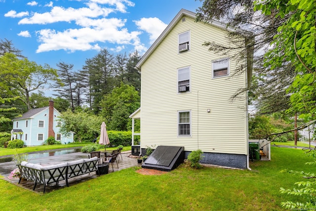 2 Middle Ln, Simsbury, CT 06070 - rear view of property featuring a lawn, a patio, and a water view