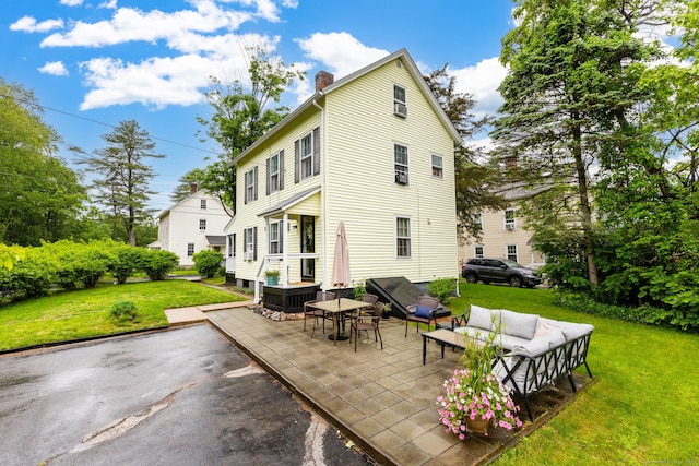 2 Middle Ln, Simsbury, CT 06070 - rear view of property with a patio, a chimney, a lawn, and outdoor lounge area