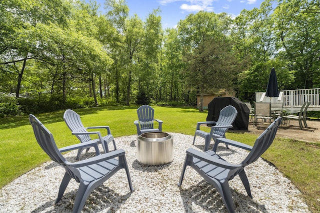 15 Ridgewood Dr, Monroe, CT 06468 - view of patio / terrace with an outdoor fire pit and view of scattered trees