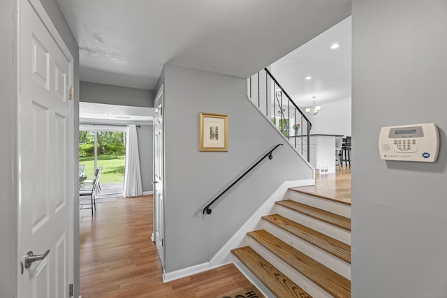 15 Ridgewood Dr, Monroe, CT 06468 - staircase with wood finished floors, baseboards, and recessed lighting