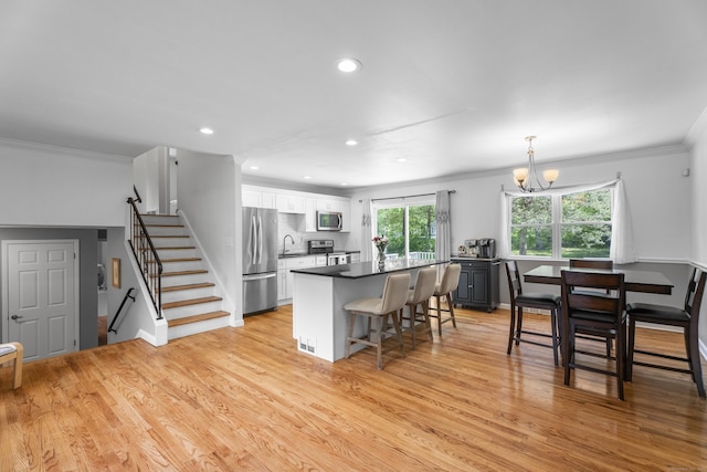 15 Ridgewood Dr, Monroe, CT 06468 - kitchen with appliances with stainless steel finishes, a sink, crown molding, white cabinetry, and recessed lighting