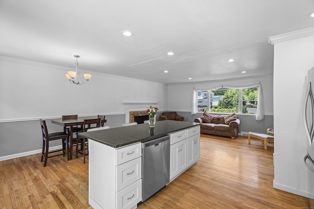 15 Ridgewood Dr, Monroe, CT 06468 - kitchen featuring stainless steel dishwasher, white cabinets, a chandelier, open floor plan, and recessed lighting