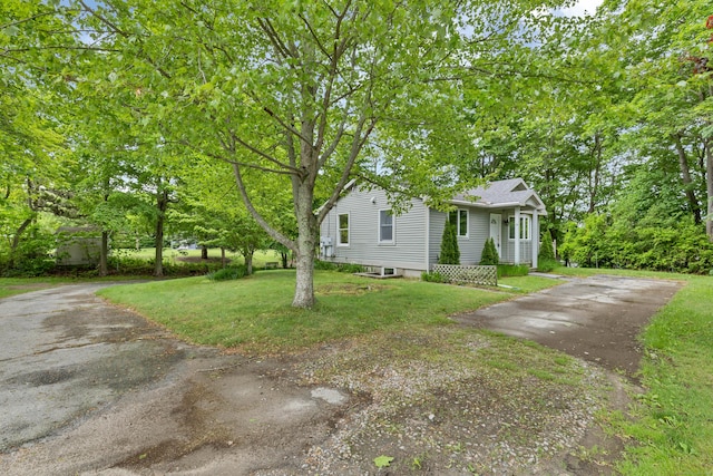 2 Lakeview Cir E, Lyme, CT 06357 - view of property exterior featuring driveway and a yard