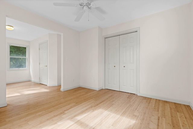 2 Lakeview Cir E, Lyme, CT 06357 - unfurnished bedroom with light wood finished floors, baseboards, a closet, and ceiling fan