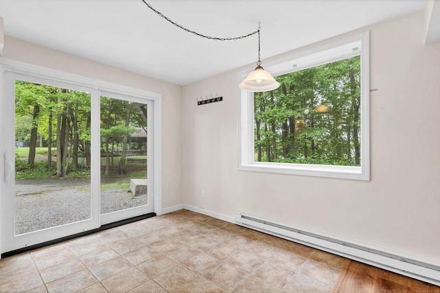 2 Lakeview Cir E, Lyme, CT 06357 - unfurnished dining area featuring a baseboard heating unit