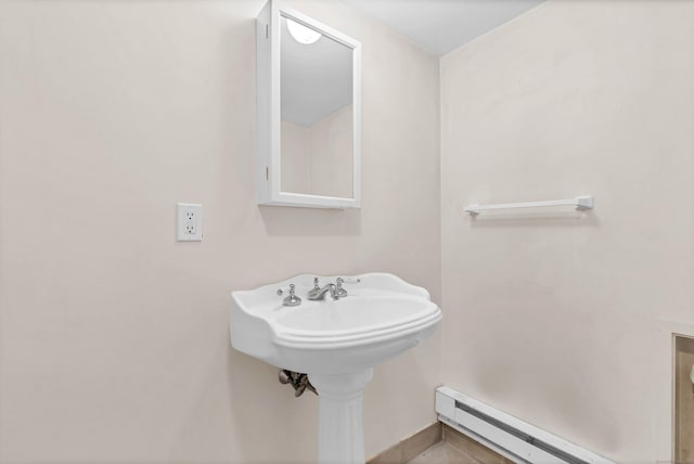 2 Lakeview Cir E, Lyme, CT 06357 - bathroom featuring a baseboard heating unit and baseboards