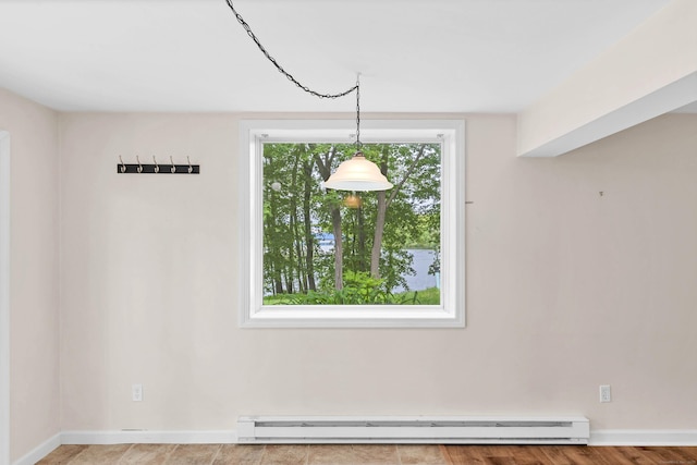 2 Lakeview Cir E, Lyme, CT 06357 - unfurnished dining area featuring a baseboard heating unit and baseboards
