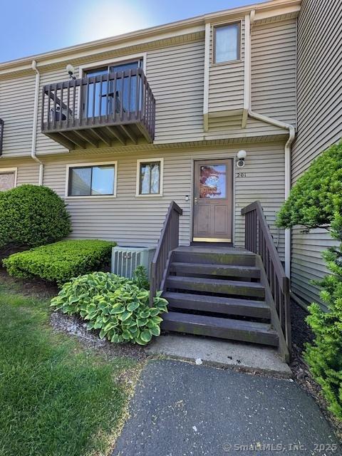 560 Yale Ave Unit 201, Meriden, CT 06450 - view of front of home featuring a balcony and central AC
